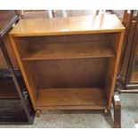 A 28" vintage oak veneered two shelf open bookcase - glass doors missing, veneer lifting and shelf