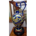 A large 20th Century Italian maiolica ewer - sold with associated hardwood stand