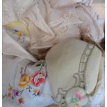 A box containing assorted vintage linen including large table cloth, etc.