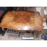 A 35" reproduction inlaid kingwood and mixed wood coffee table with decorative serpentine top, set