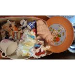 A box of assorted ceramics including Watcombe plaque with hand painted flowers, Wade Whimsies, etc.