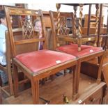 A set of six reproduction mahogany Georgian style dining chairs with upholstered drop-in seats,