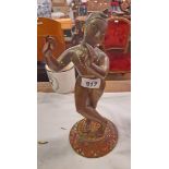 An Indian bronze figure of a dancing lady with remains of original polychrome paint