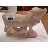 An Indian carved alabaster figure of a cow and calf - damaged