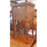 A 19th Century mahogany gentleman's washstand, set on turned and reeded legs - comprehensive damage