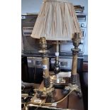 A pair of decorative brass table lamps of Rococo candlestick form - sold with a modern brass table