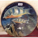 A large sgraffito fish decorated dish