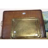 An old oak serving tray with copper corners and handles - sold with an eastern chased brass tray