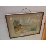 John Shapland: a gilt framed watercolour depicting a view of a beach with a town in the background -