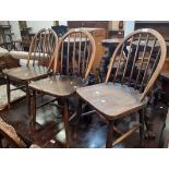 Five assorted hoop stick back kitchen chairs including Ercol examples - various condition