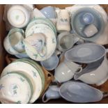 A box of assorted china tea and dinner ware