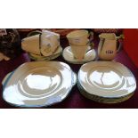 An Art Deco Burleigh Pottery part tea set comprising six trios, milk jug, and bread and butter