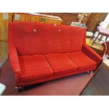 A 5' 8" retro three seater settee with remains of original red striped button back upholstery, set