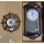 A boxed Acctim quartz wall clock - sold with a decorative pressed metal framed Shortland, Smiths