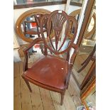 A set of six 1920's Georgian style mahogany framed fan back dining chairs with decorative pierced