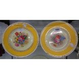 A pair of George Jones cabinet plates decorated with hand painted floral sprays by W.Birbeck