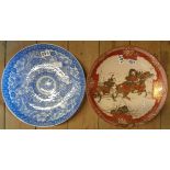 A Japanese late Satsuma dish decorated with mounted samurai warriors with Kozan mark to base and