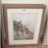 A pair of 19th Century watercolours, one depicting a thatched cottage with figures and the other