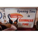 A large Tin Guinness sign