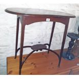 A 30" Edwardian walnut kidney shaped two tier occasional table with decorative scroll inlay to