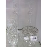 A pair of glass candlesticks, vase and posy bowl