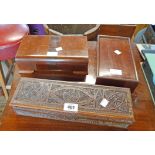 Three wooden boxes comprising Indian carved glove box, 1930's cigarette box and a mahogany chess