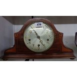 A mid 20th Century inlaid walnut cased mantel clock with eight day chiming movement
