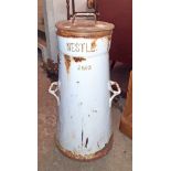 A vintage Nestle milk churn with customer name plaques - a/f