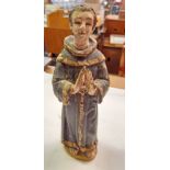 An antique ecclesiastical carved wood figure with polychrome and gilt decoration