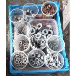 A small crate containing assorted nuts, bolts, washers, etc.