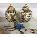 A pair of Noritake ovoid potpourri jars and covers, profusely decorated with coloured enamels and