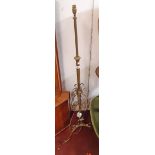 A late Victorian brass ornate telescopic lamp standard - converted to electric