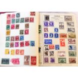 A Mitre stamp album containing a collection of 20th Century hinge mounted world stamps