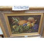 O. Clare: an ornate gilt framed oil on board still life with various fruits and foliage - bears an