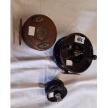 Three fishing reels including a large bakelite Allcock Aerialite