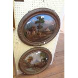 A pair of 19th Century gilt gesso oval framed reverse oil paintings on domed glass, one depicting