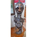 An African tribal carved wood figure from the Lenkiewicz of 2008