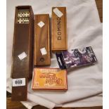 A boxed bone and ebony domino set - sold with similar domino set mikado set