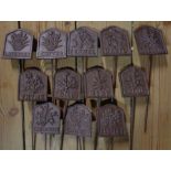 A set of twelve cast iron herb garden labels