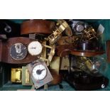 A crate containing a selection of small mainly timepieces, etc. - various condition