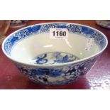 An antique Chinese blue and white bowl decorated with figure and flowers