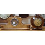 A 1930's walnut cased timepiece with decorative dial bearing retailler Sermon, Torquay with French