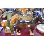 Four pottery horse figurines comprising Beswick shire, unmarked grey shire, and two Tang style