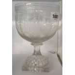 An early 19th Century oversized glass rummer on moulded lemon squeezer base, decorated with an