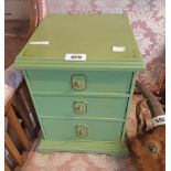 A 10 1/4" painted mahogany miniature chest of three long graduated drawers with moulded top and