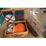 A Picnic Hamper and Contents - sold with another similar empty