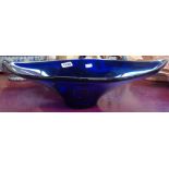 A large blue art glass bowl