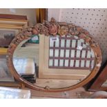 A 20" diameter vintage Barbola wall mirror with bevelled plate - some decoration loss