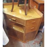 A 36" mid 20th Century oak corner dressing table with fall-front compartment, four short drawers and