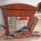 An Edwardian walnut and strung framed bevelled oblong pier mirror with arched top - corner bosses